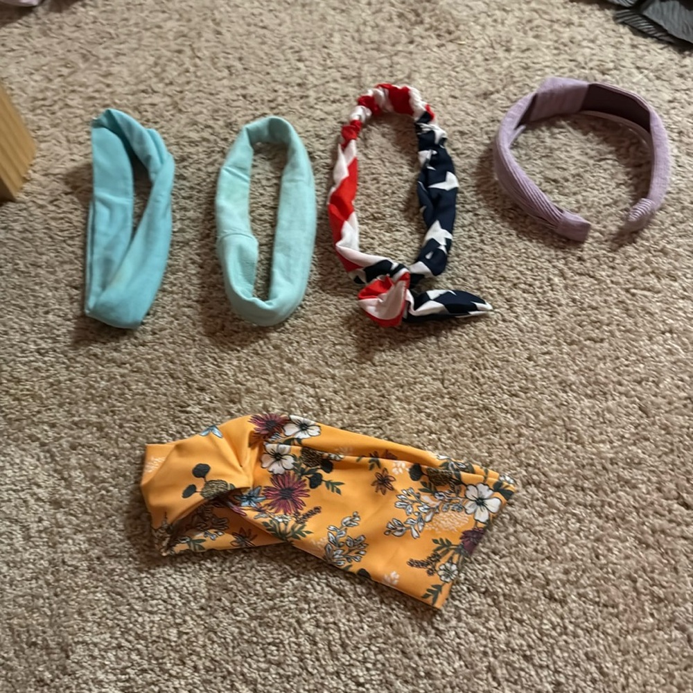 I’m selling five headbands two blue one red and blue one purple one is yellow